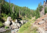 The North Fork John Day River, at hike's destination, runs through a rugged, rocky canyon.
