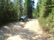 The trailhead access road requires a high-clearance vehicle, preferably with 4-wheel drive backup.