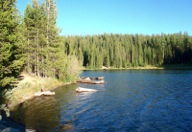 Olive Lake is a popular camping area in summer and convenient to the trailhead.