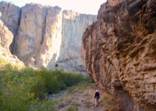 Louse Canyon is a narrow, intimate gorge eroded between vertical, 300'-high walls of rhyolite.