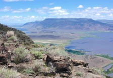 The view east from Lynch's Rim, over Crump Lake, to the Hart Mountain plateau.