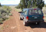 When dry, Road 7105 is mostly in good shape, but it has some deeply rutted and rocky spots.